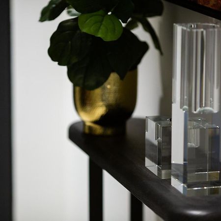 One Global Resorts Green Square Sydney Exterior photo A vase and candle holder