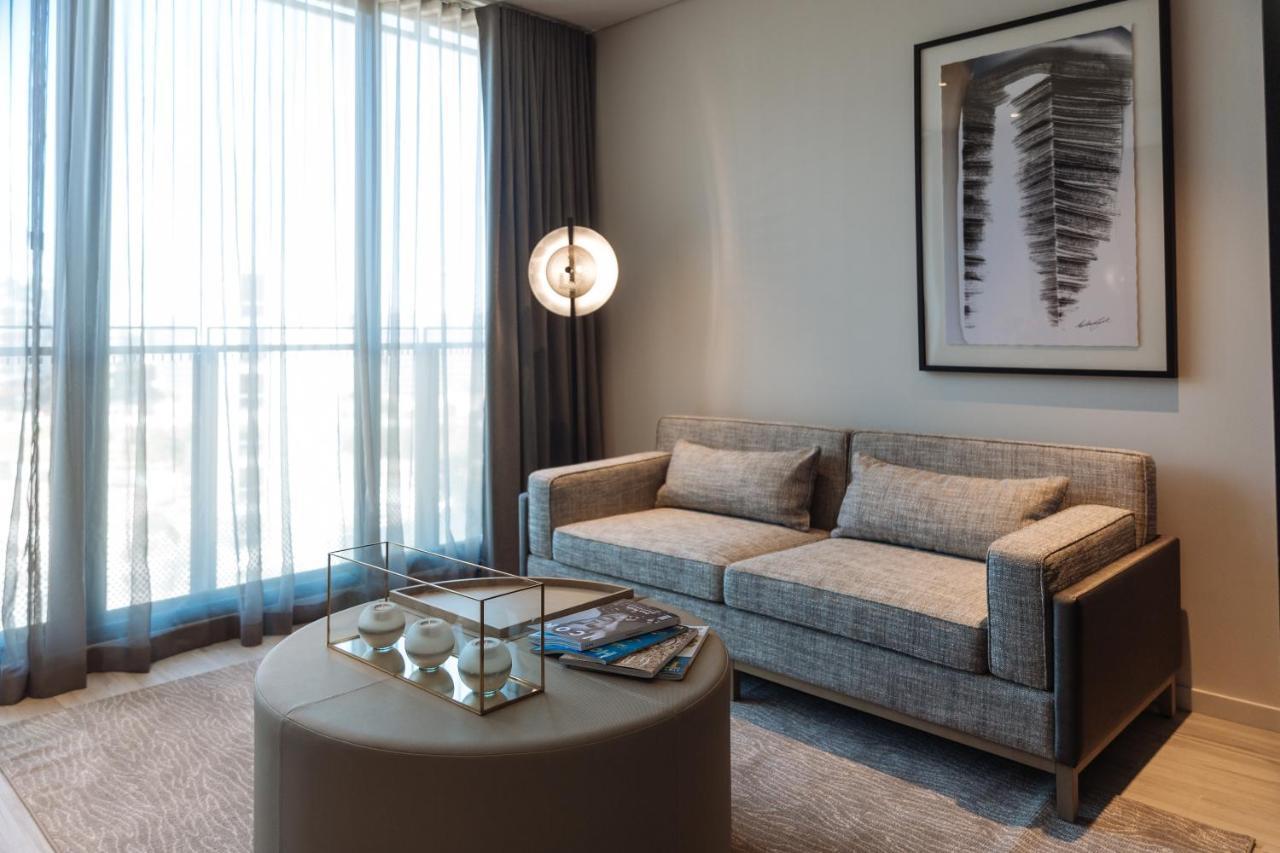 One Global Resorts Green Square Sydney Exterior photo A living room at The Ritz-Carlton, DIFC